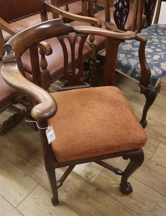 A George II mahogany corner elbow chair